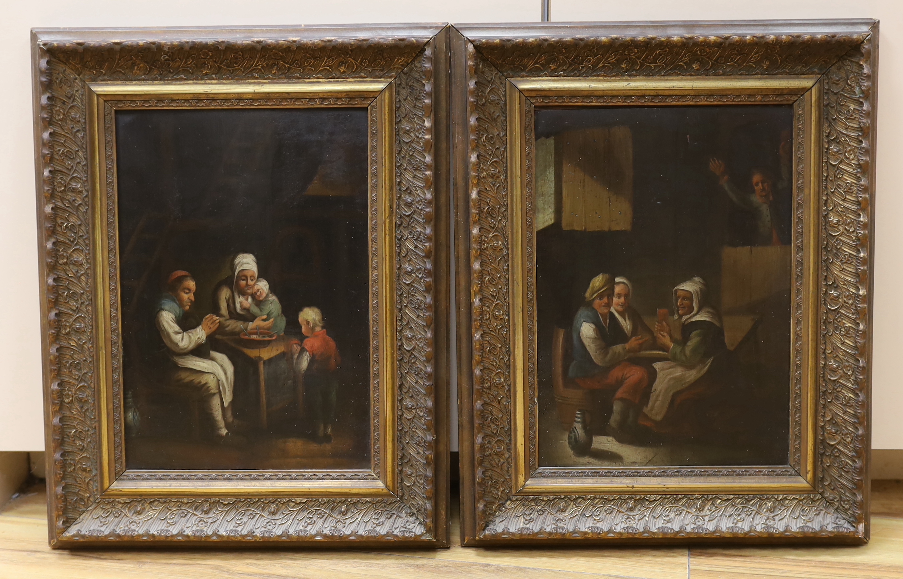 Pair of 17th century style German school, oils on board, Tavern scene and Family seated in an interior, Frankfurt labels verso, 30cm x 21cm